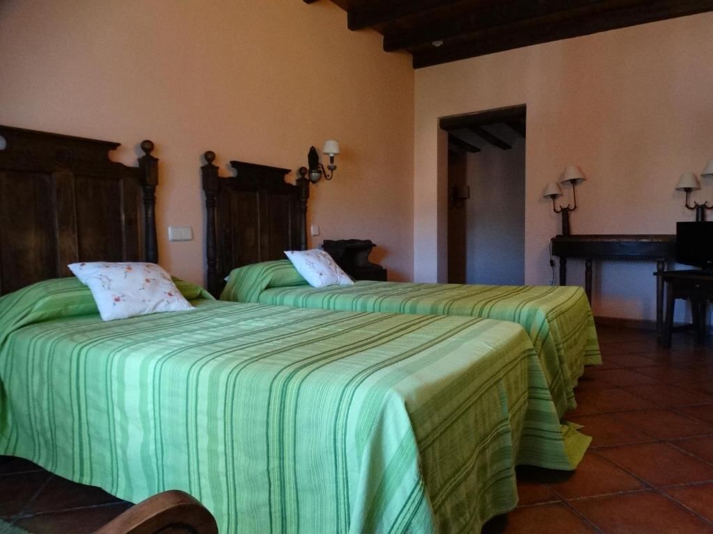 Room at Hostal EL MESON in Sigüenza 1